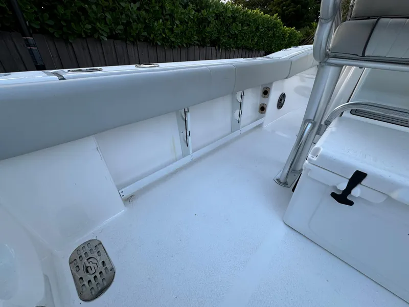 Slide: The Image of 2022 Sea Fox 248 Commander boat interior with seating and storage compartments. - 40