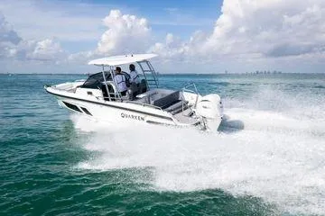 Slide: The Image of 2024 Quarken 27 T-Top V2 boat cruising on open water. - 3