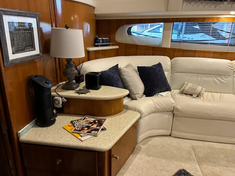 Slide: The Image of Luxurious interior of a 2000 Carver 396 yacht with plush seating and elegant decor. - 29