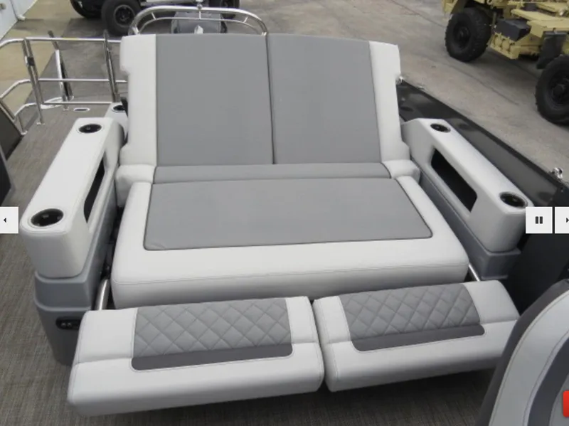 Slide: The Image of 2023 Godfrey AquaPatio 255 DFLW boat with luxurious seating and cup holders. - 12