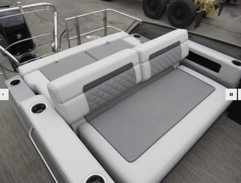 Slide: The Image of 2023 Godfrey AquaPatio 255 DFLW boat with luxurious seating and cup holders. - 4