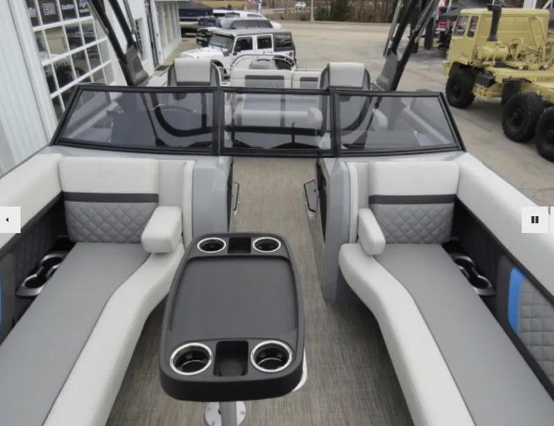 Slide: The Image of 2023 Godfrey AquaPatio 255 DFLW interior with seating and table. - 8