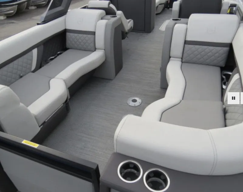 Slide: The Image of 2023 Godfrey AquaPatio 255 SBC interior with luxurious seating and cup holders. - 8