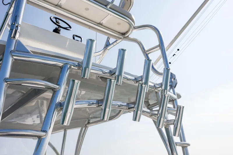 Slide: The Image of 2023 SeaHunter 46 CTS boat with stainless steel rod holders and ladder. - 33