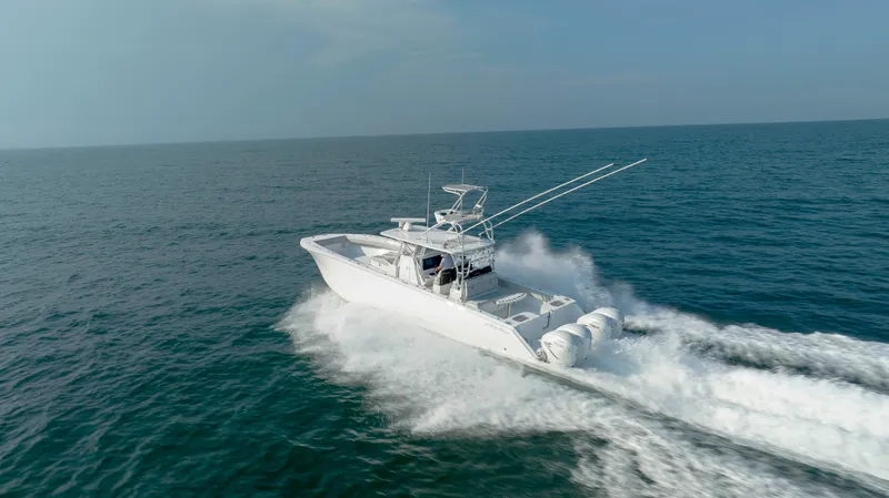 Slide: The Image of 2023 SeaHunter 46 CTS cruising swiftly on open ocean waters. - 40