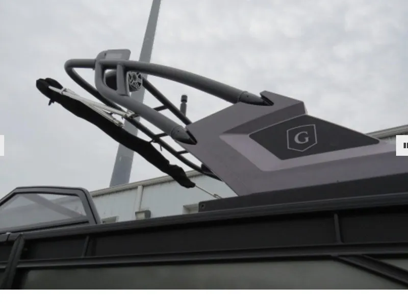 Slide: The Image of Close-up of 2023 Godfrey AquaPatio 255 ULW boat's sleek design and structure. - 4