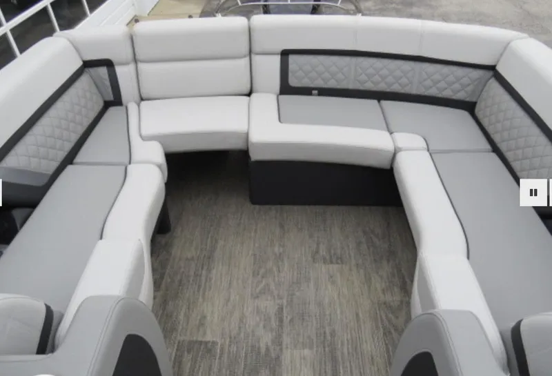 Slide: The Image of 2023 Godfrey AquaPatio 255 ULW boat interior with spacious, luxurious seating. - 8