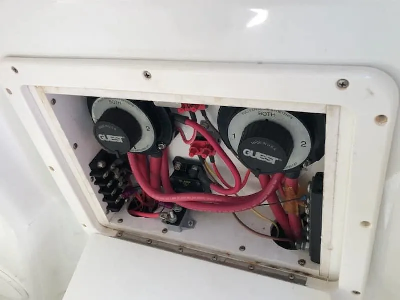 Slide: The Image of 2004 Triton 2690 CC boat electrical panel with Guest battery switches. - 7