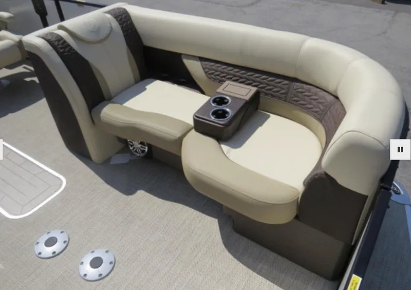 Slide: The Image of 2023 Godfrey Monaco 235 SFL boat seating area with cup holders. - 12