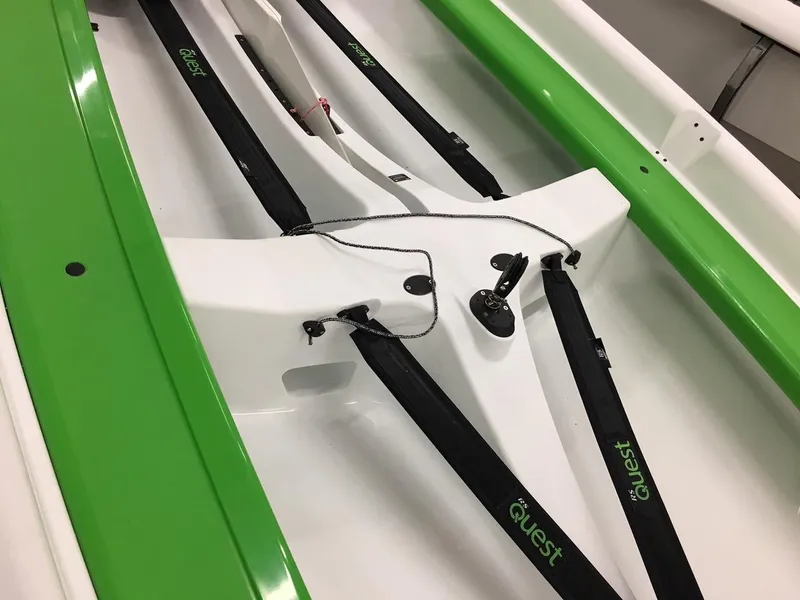 Slide: The Image of 2025 RS Quest boat interior with green and white design, featuring rigging components. - 4