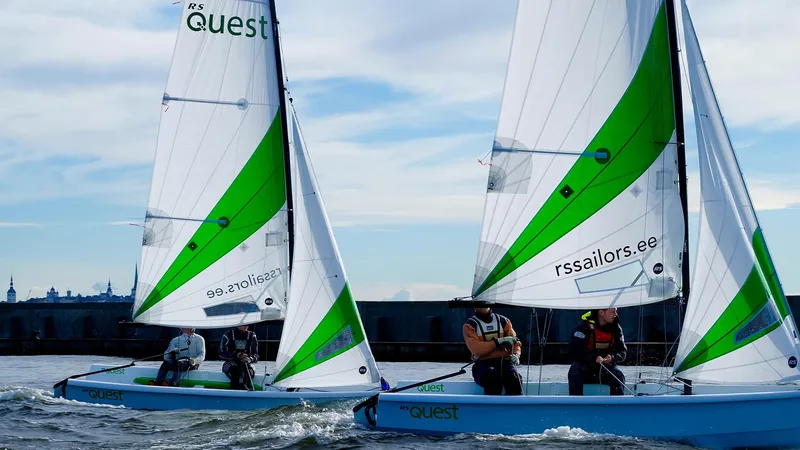 Slide: The Image of Two RS Quest sailboats racing on open water, 2025 model. - 7