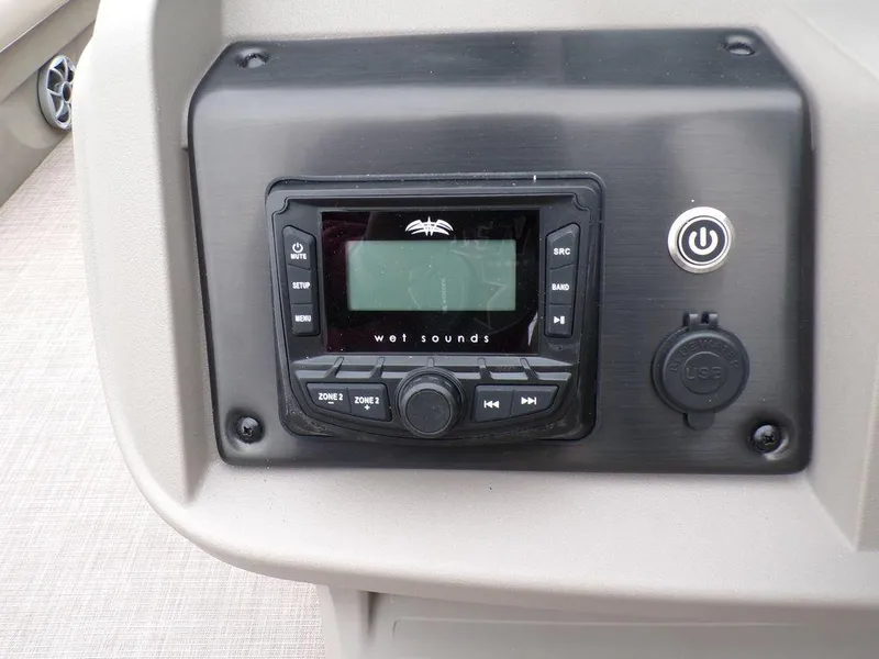 Slide: The Image of 2024 Sun Tracker SportFish™ 22 DLX boat stereo system and control panel. - 18