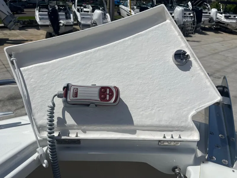 Slide: The Image of 2024 Jeanneau Leader 9.0 CC boat control panel with remote. - 16