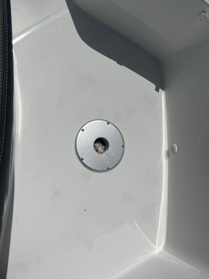 Slide: The Image of 2024 Jeanneau Leader 9.0 CC boat deck detail with circular fixture. - 17