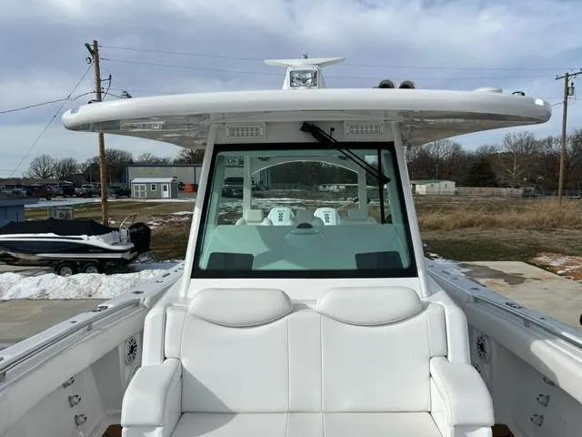 Slide: The Image of 2023 HCB 39 Speciale boat with white seating and windshield. - 14