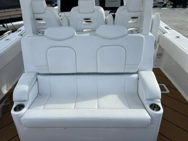 Slide: The Image of 2023 HCB 39 Speciale boat with white leather seating and cup holders. - 6
