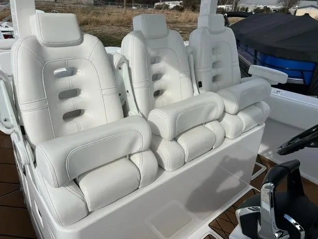 Slide: The Image of 2023 HCB 39 Speciale boat with luxurious white leather seating. - 8