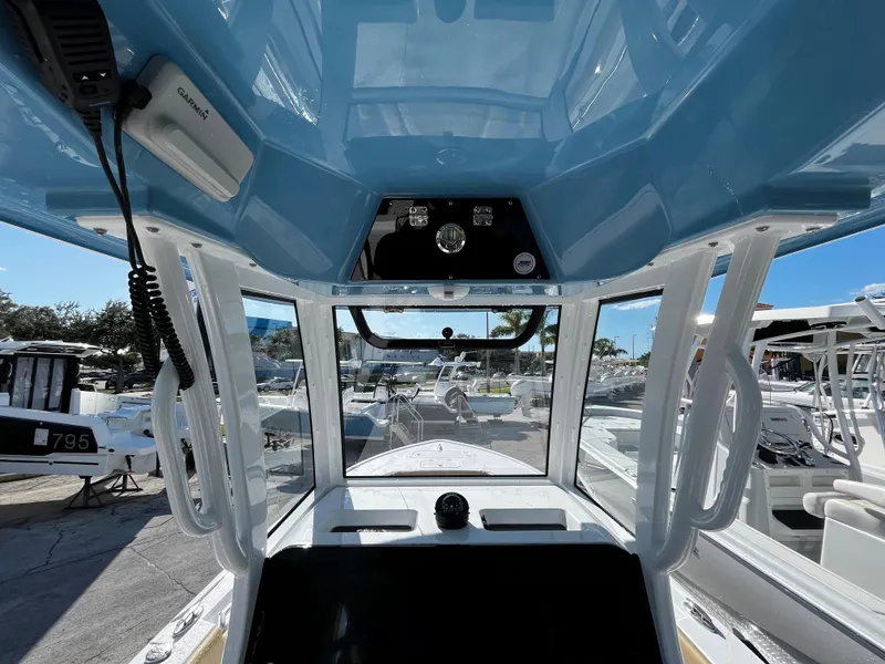 Slide: The Image of 2024 Sportsman Masters 247OE Bay Boat console and helm station. - 10