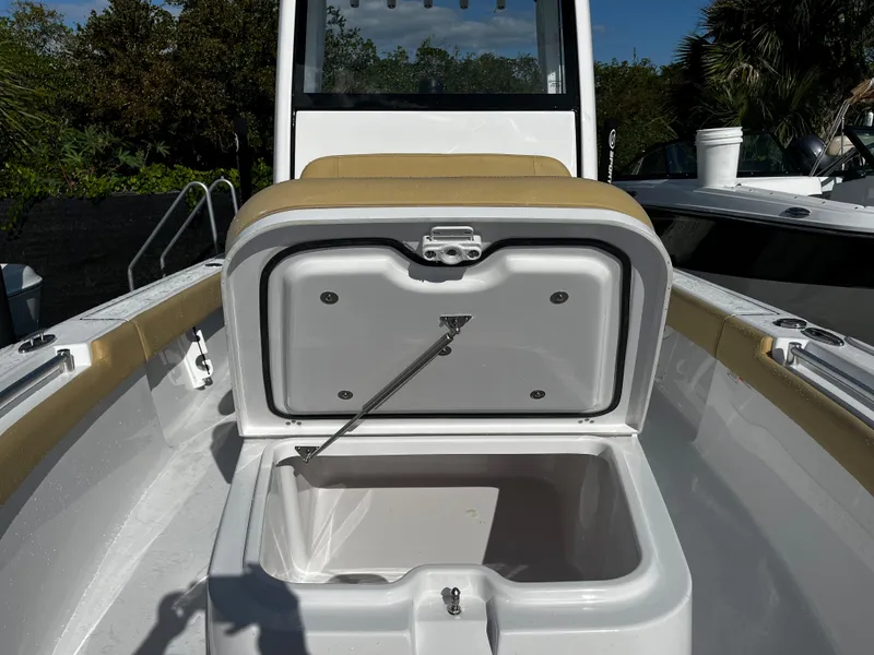 Slide: The Image of 2024 Sportsman Masters 247OE Bay Boat with open storage compartment. - 15