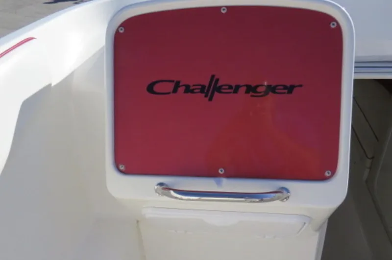Slide: The Image of 2007 Challenger DDC 33 boat interior with red panel and logo. - 11