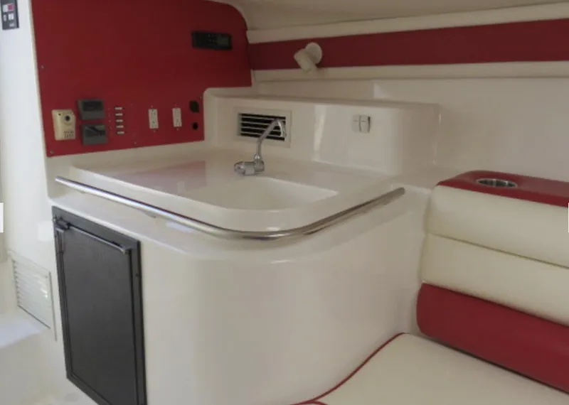 Slide: The Image of 2007 Challenger DDC 33 boat interior with sink and seating area. - 16