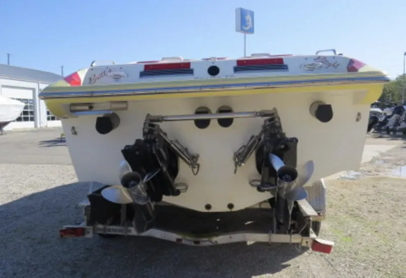 Slide: The Image of Rear view of a 2007 Challenger DDC 33 boat with dual propellers. - 3