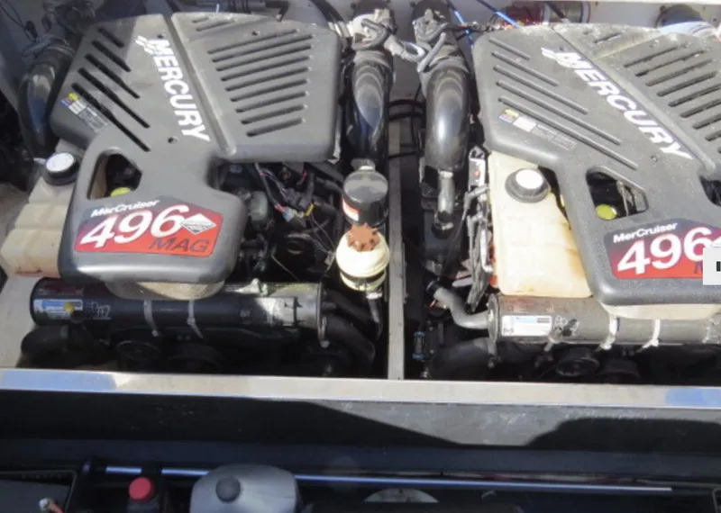 Slide: The Image of Twin MerCruiser 496 MAG engines in a 2007 Challenger DDC 33 boat. - 7