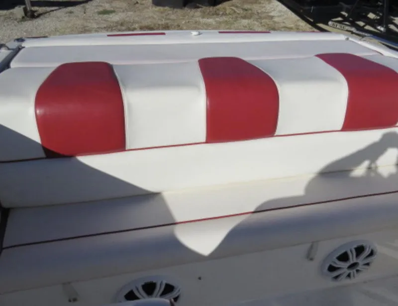Slide: The Image of Red and white striped seat cushion on a 2007 Challenger DDC 33 boat. - 9