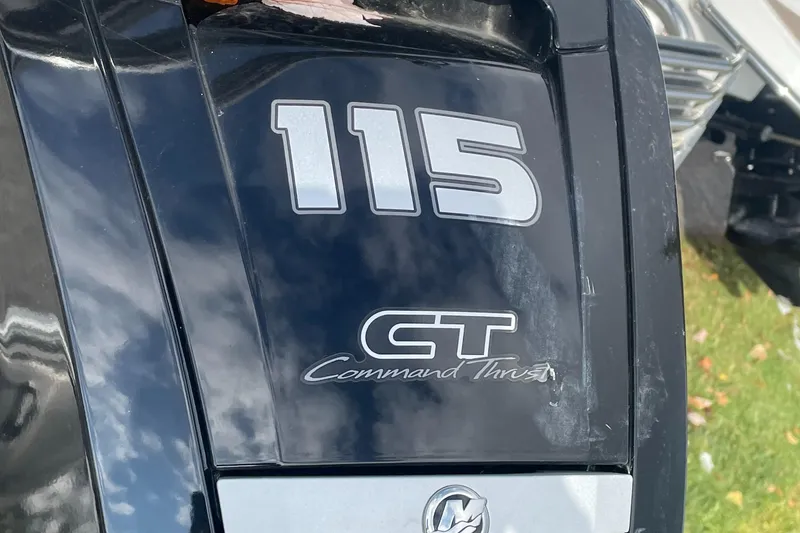 Slide: The Image of Close-up of a 2022 Berkshire 22CL2LE25 boat engine with 115 CT Command Thrust label. - 7