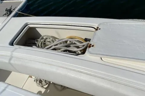 Slide: The Image of Storage compartment with ropes on a 2008 Albemarle 31 boat. - 23