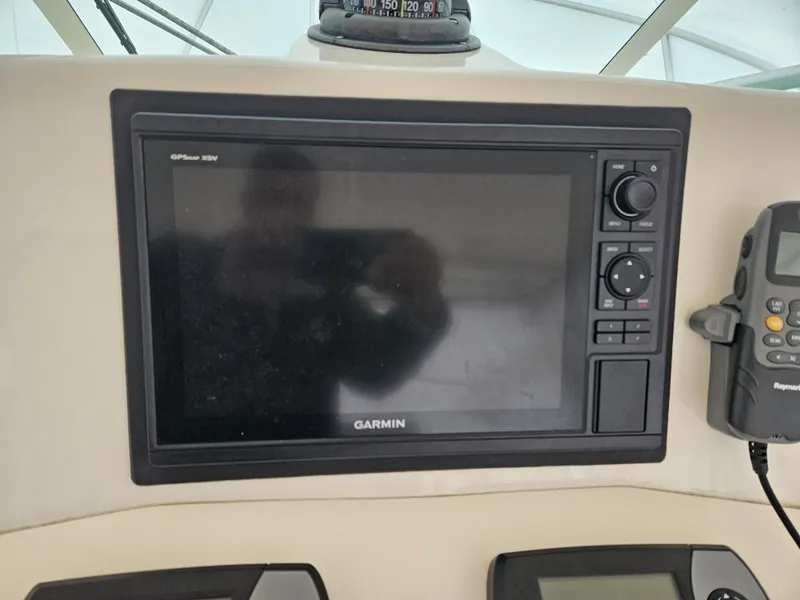 Slide: The Image of Garmin GPS display on 2008 Albemarle 31 boat dashboard. - 8