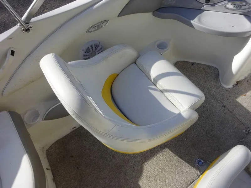 Slide: The Image of 2004 VIP 185 Vegas boat interior with white and yellow seating. - 19