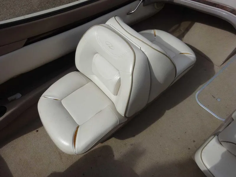 Slide: The Image of Worn interior seating of a 2000 Regal 2100 LSR boat. - 11