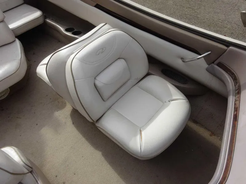Slide: The Image of 2000 Regal 2100 LSR boat interior, white leather seat, clean condition. - 12