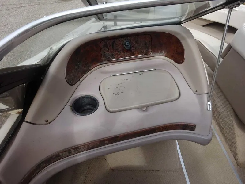 Slide: The Image of Interior dashboard of a 2000 Regal 2100 LSR boat. - 2