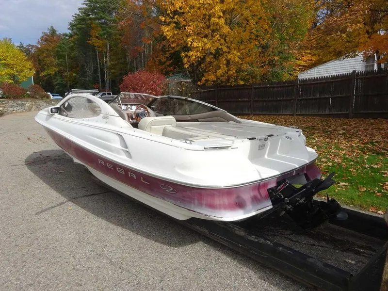 Slide: The Image of 2000 Regal 2100 LSR boat on trailer, autumn background. - 9
