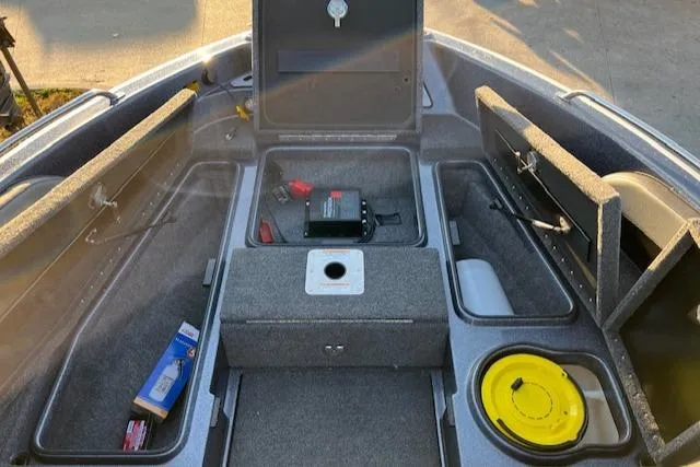Slide: The Image of 2024 Lund 189 Tyee GL boat interior storage compartments and equipment. - 15