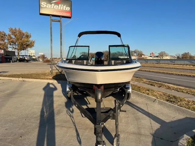 Slide: The Image of 2024 Lund 189 Tyee GL boat on a trailer in a parking lot. - 8