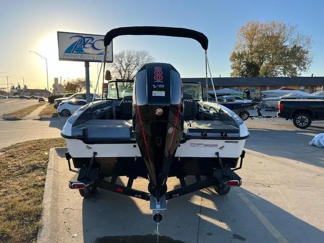 Slide: The Image of 2024 Lund 189 Tyee GL boat with outboard motor at dealership. - 9