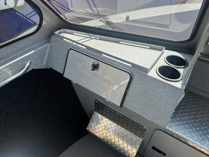 Slide: The Image of Interior of 2024 KingFisher 2025 Escape boat with storage and cup holders. - 33
