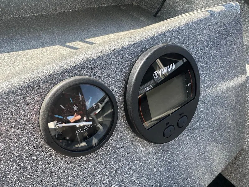 Slide: The Image of Close-up of KingFisher 2025 Escape 2024 dashboard with Yamaha gauges. - 38