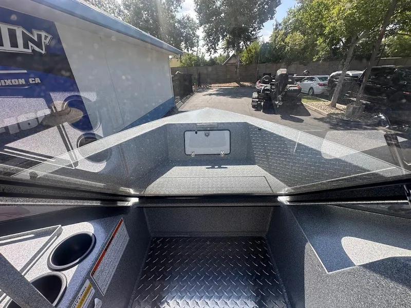 Slide: The Image of Interior view of 2024 KingFisher 2025 Escape boat with diamond plate flooring. - 40