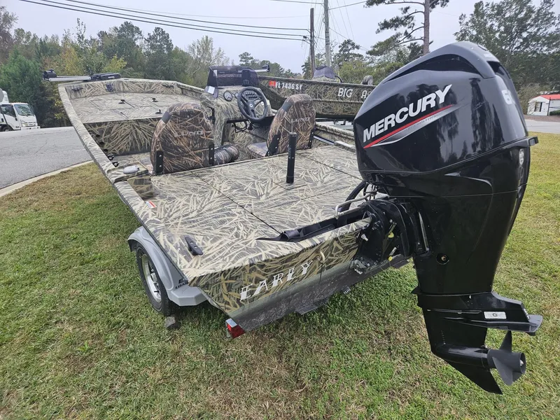 Slide: The Image of 2021 Lund 1760 Predator SC boat with Mercury outboard motor on trailer. - 5