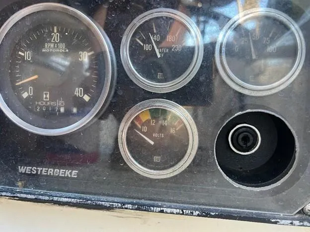 Slide: The Image of Instrument panel of a 1986 Pacific Seacraft 37 sailboat with Westerbeke gauges. - 10