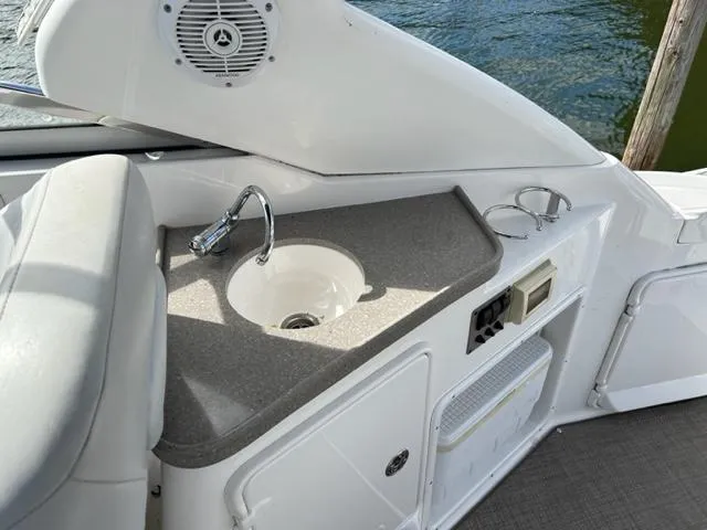Slide: The Image of 2010 Regal 3060 Window Express boat interior sink and counter area. - 12