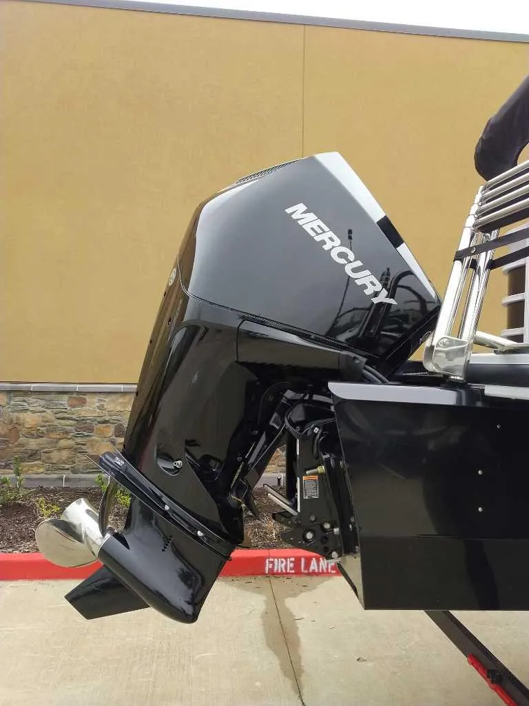 Slide: The Image of 2024 Ranger Reata 223C with Mercury outboard motor. - 6