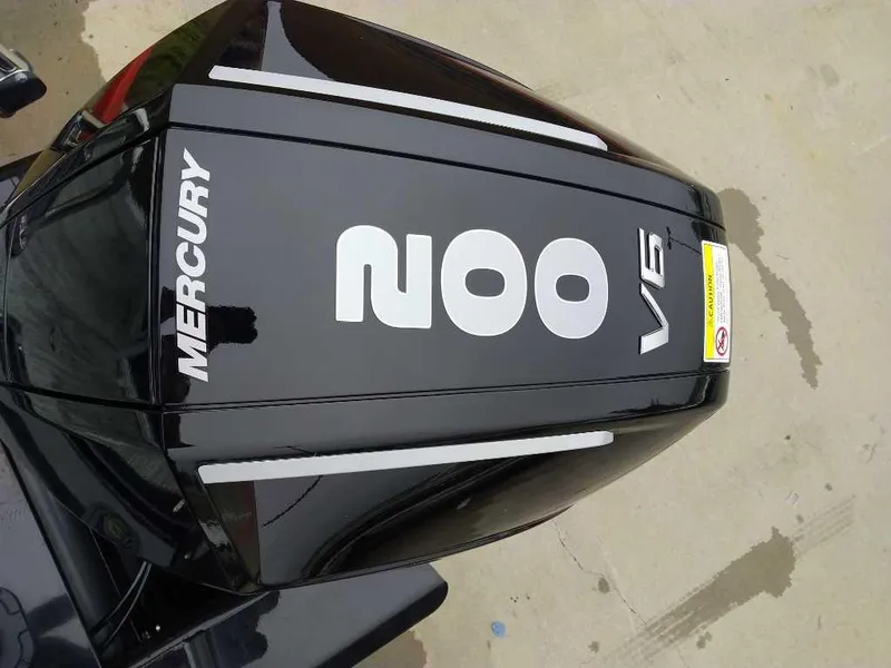Slide: The Image of Mercury 200 V6 outboard motor on 2024 Ranger Reata 223C boat. - 7