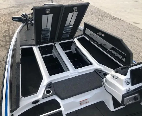 Slide: The Image of 2022 Nitro Z21 XL boat with open storage compartments and fishing rod holders. - 16