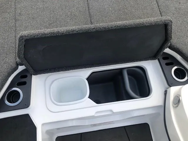 Slide: The Image of 2022 Nitro Z21 XL boat storage compartments and cup holders. - 18
