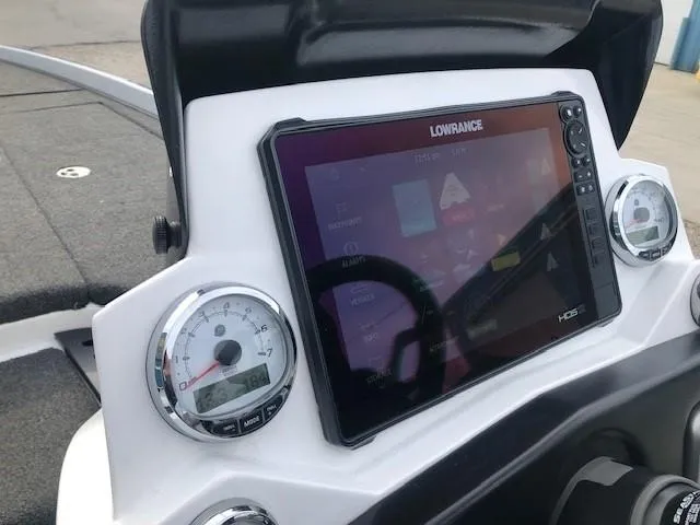 Slide: The Image of 2022 Nitro Z21 XL boat dashboard with Lowrance HDS display and gauges. - 28